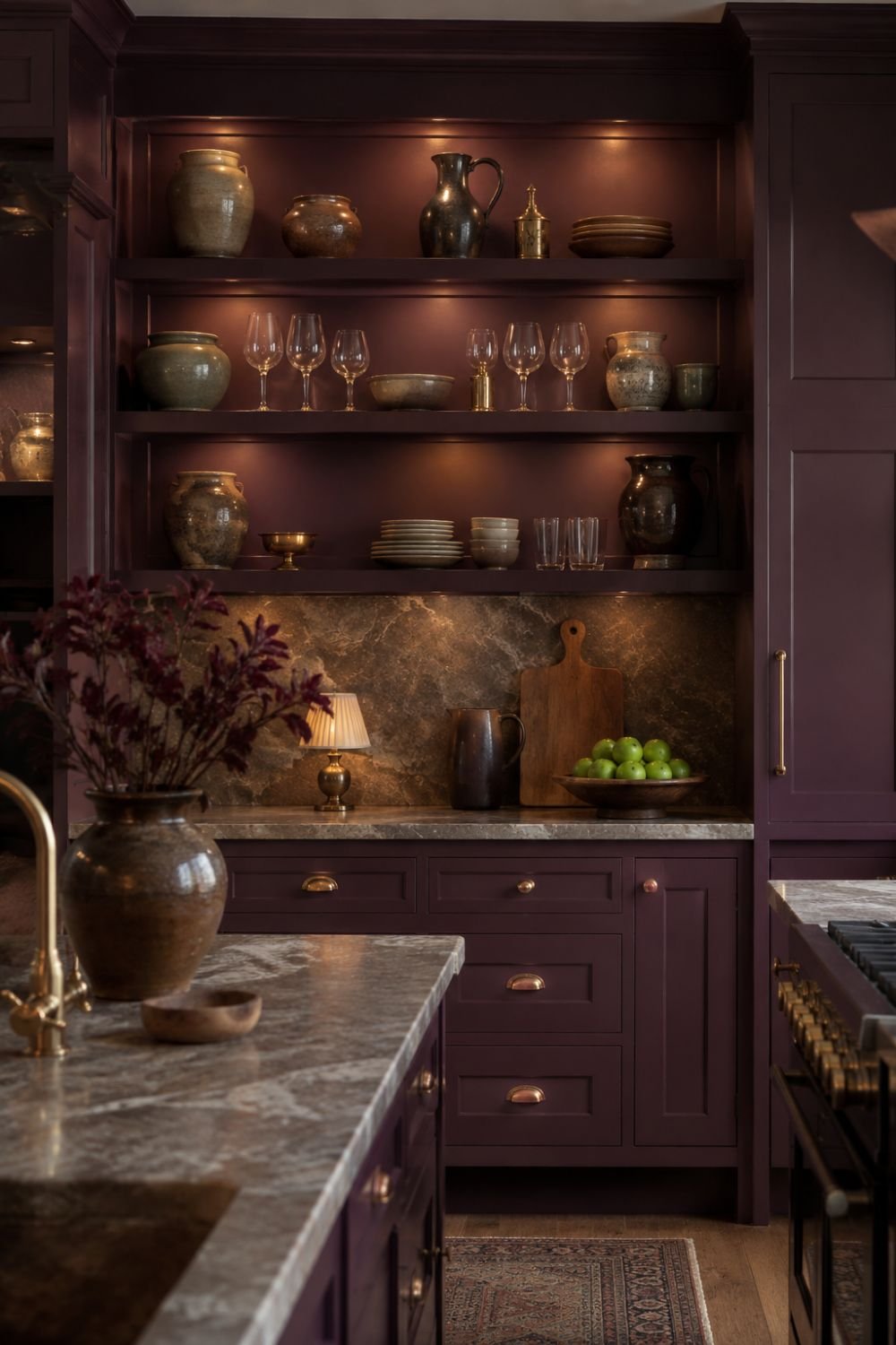 Aubergine kitchen shelves styled with vintage pottery and accessories