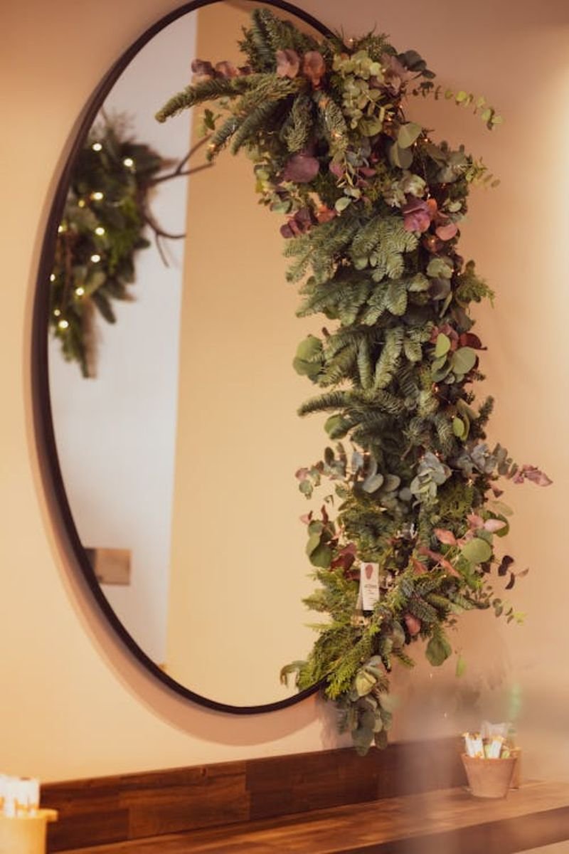 Autumn dried leaf wreath hanging inside over mirror wall fall living room decor 