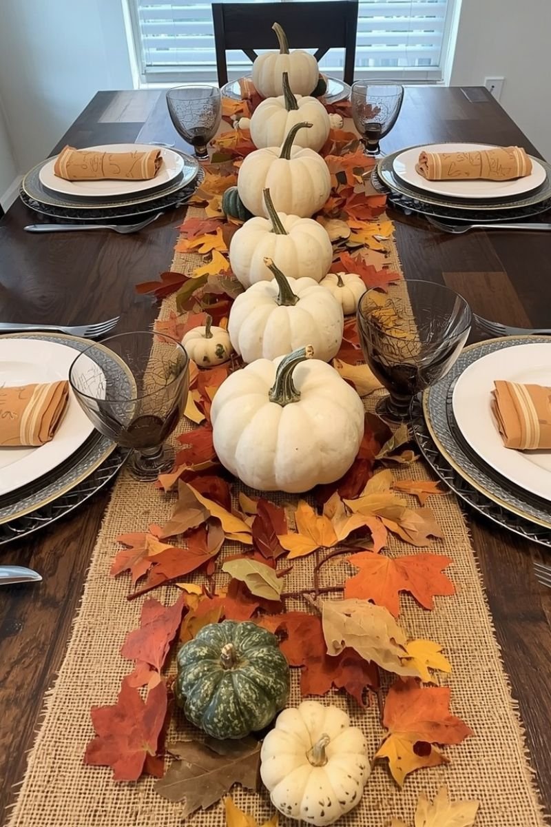 Dollar Tree burlap table runner mini pumpkins leaves acorns fall tablescape