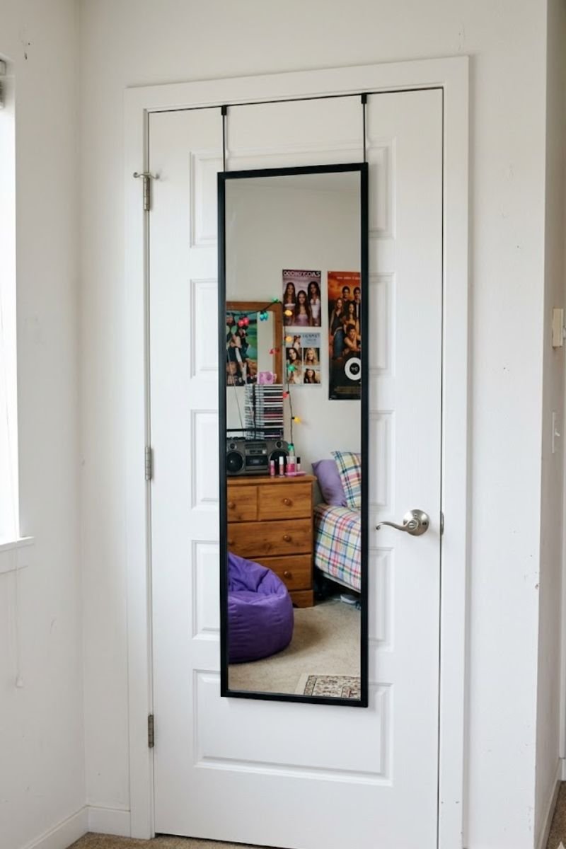 Full-length mirror on white closet door in Y2K bedroom
