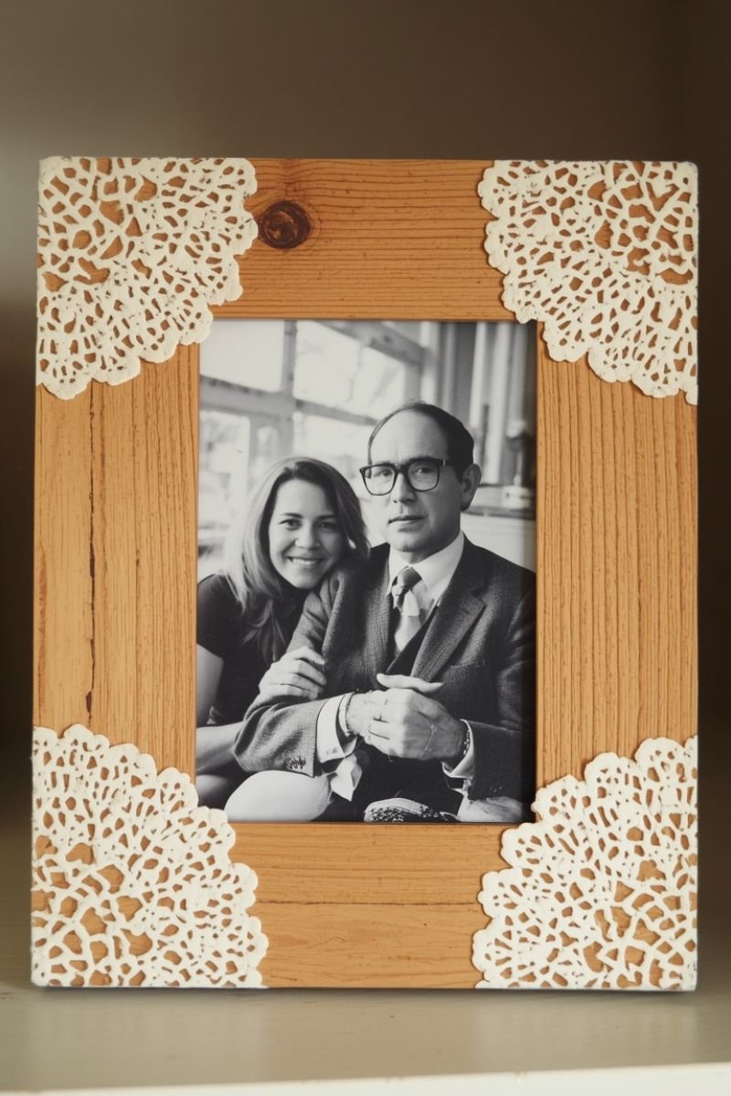 Wooden photo frame with white doily sections glued around the border as decoration
