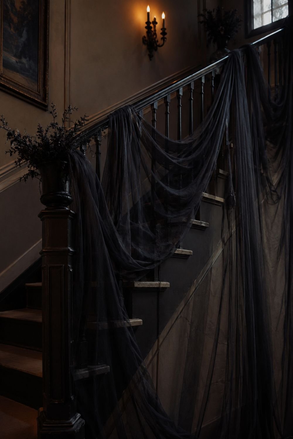 Dark sheer fabric creating elegant ghostly effect on staircase