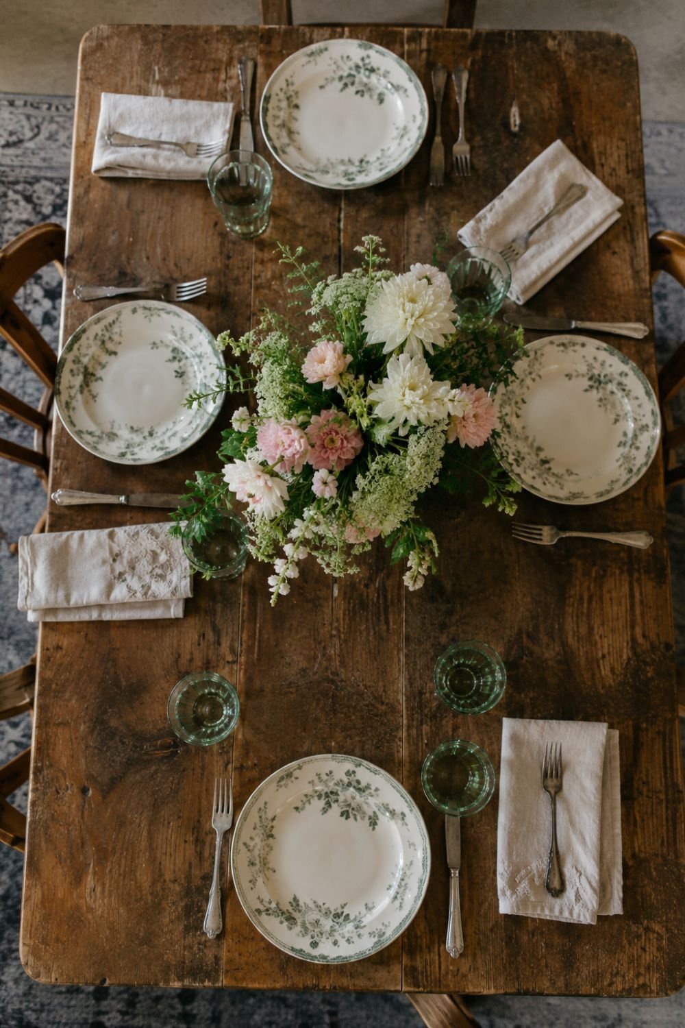 Vintage wooden dining table with natural patina and worn finish