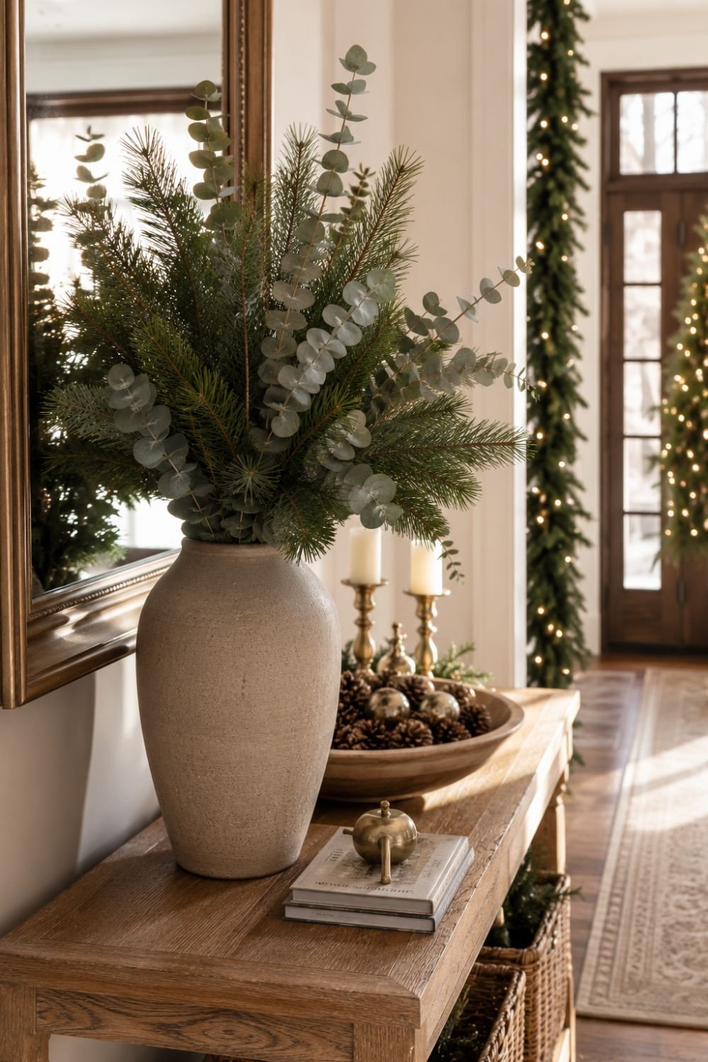 mixed greenery christmas entryway decor idea