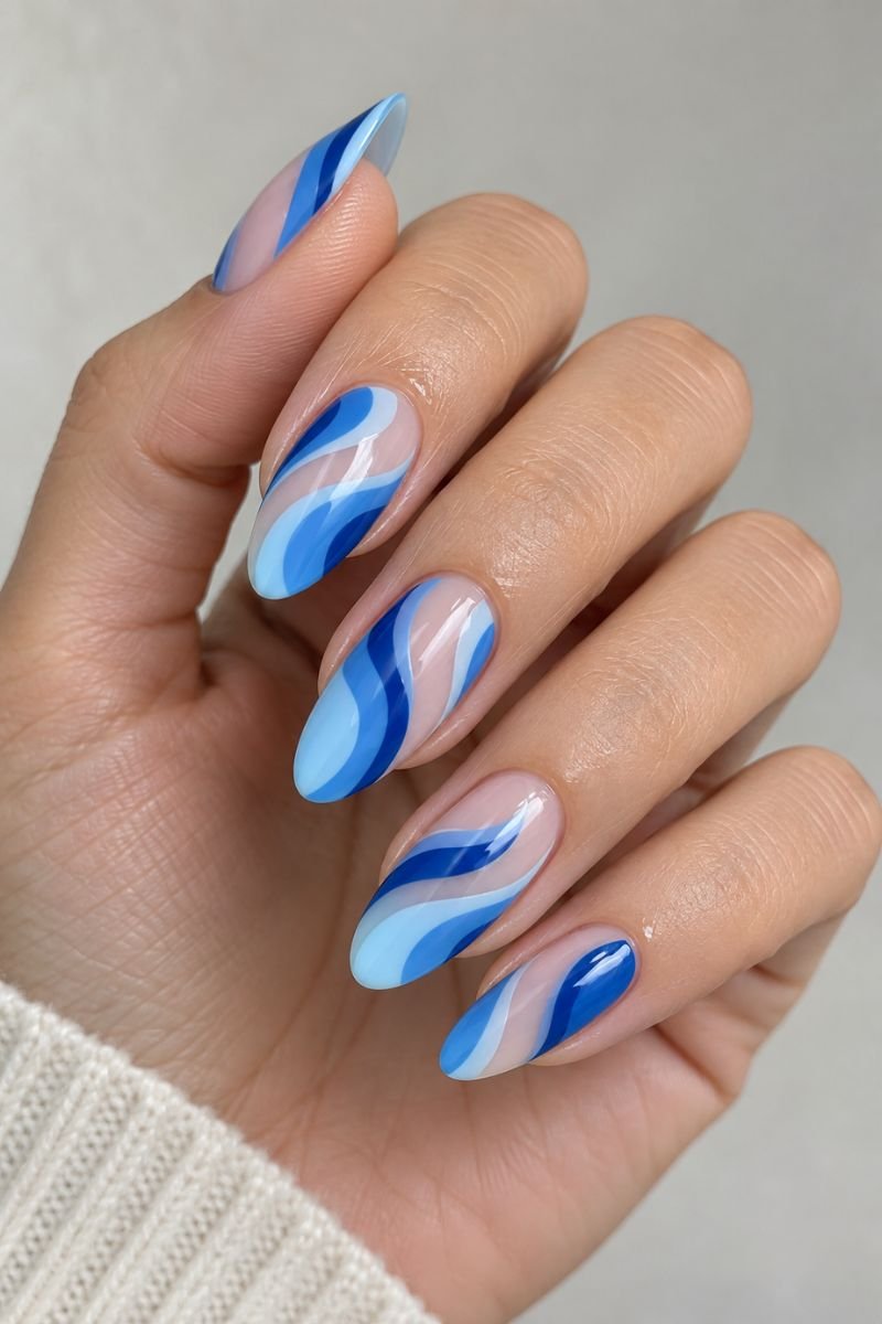Blue nail designs idea swirl technique