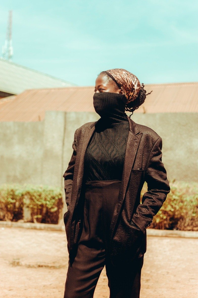 Turtleneck under a blazer with wide leg trousers