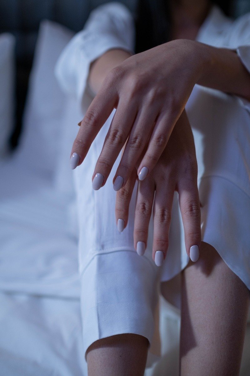 Milky white almond shaped january nails