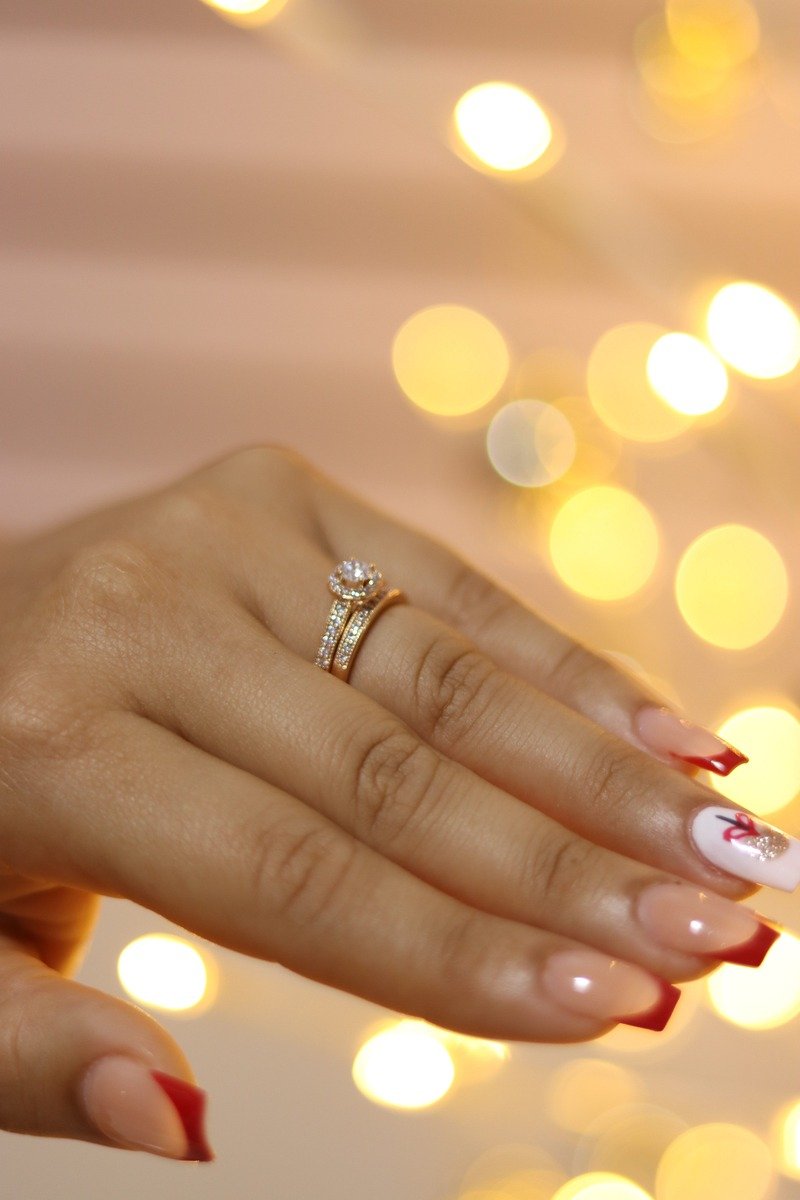 French manicure with red tips on a nude base