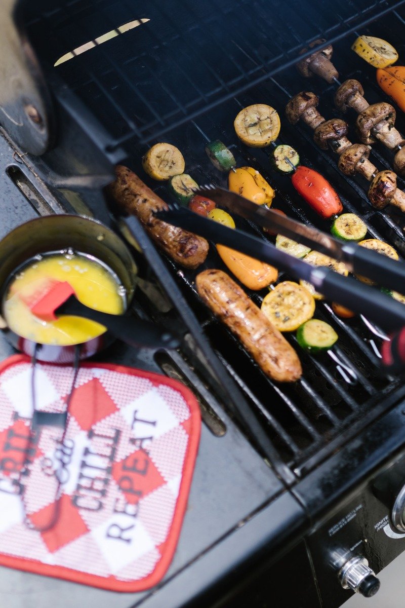 Barbecue tool set in a case on a grill