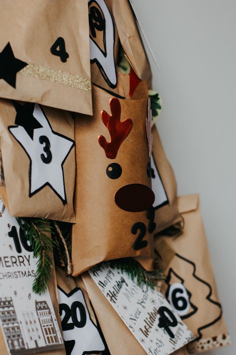 Numbered envelopes pinned in rows as an advent calendar