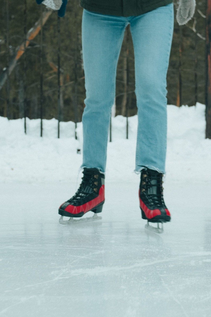 People ice skating at an outdoor rink