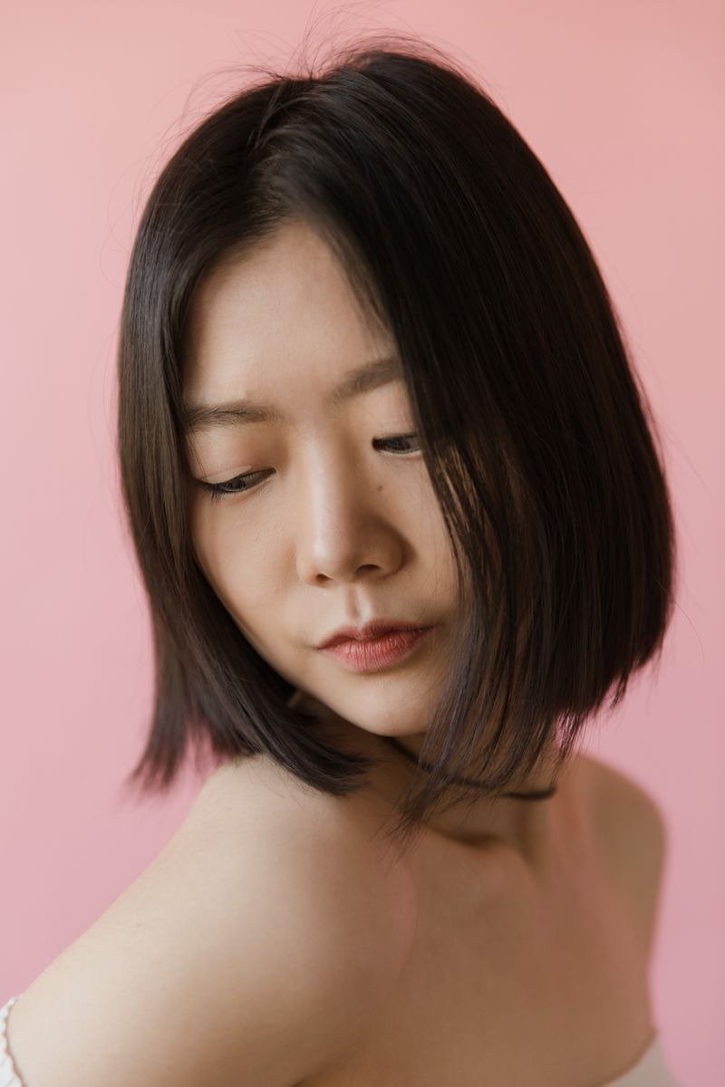 Sleek straight long bob with smooth blended layers and glossy finish