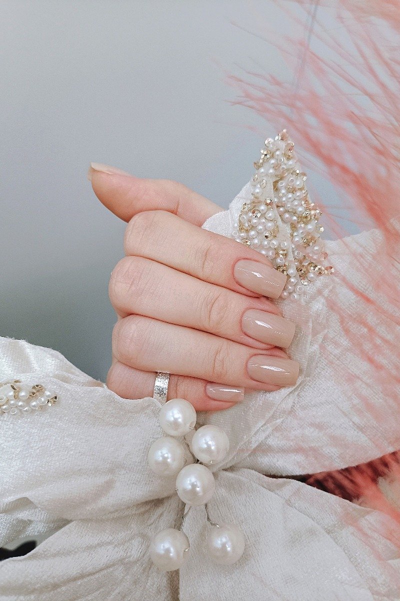 Nude manicure on natural nails