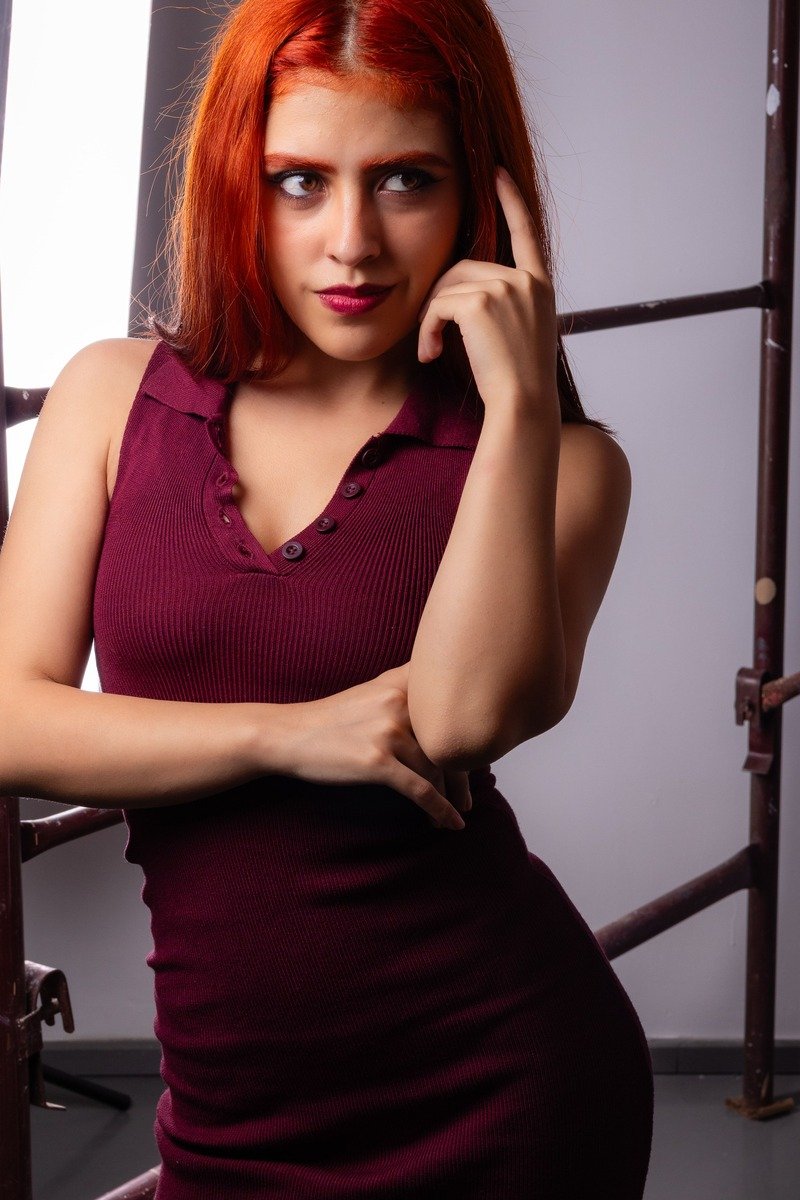Cherry cola hair with face-framing money piece highlights