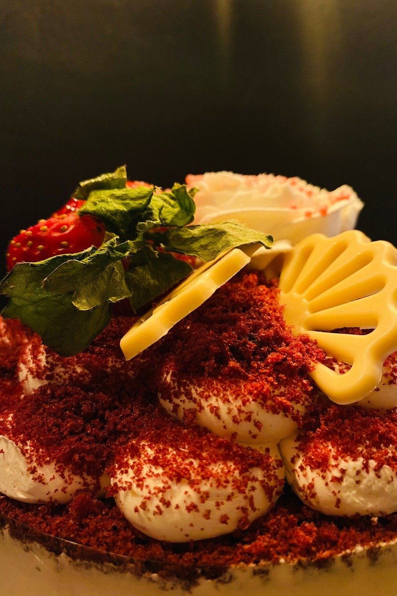 Red velvet christmas cake with white frosting