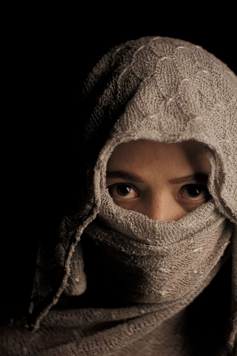 Woman wearing a knitted wool hood
