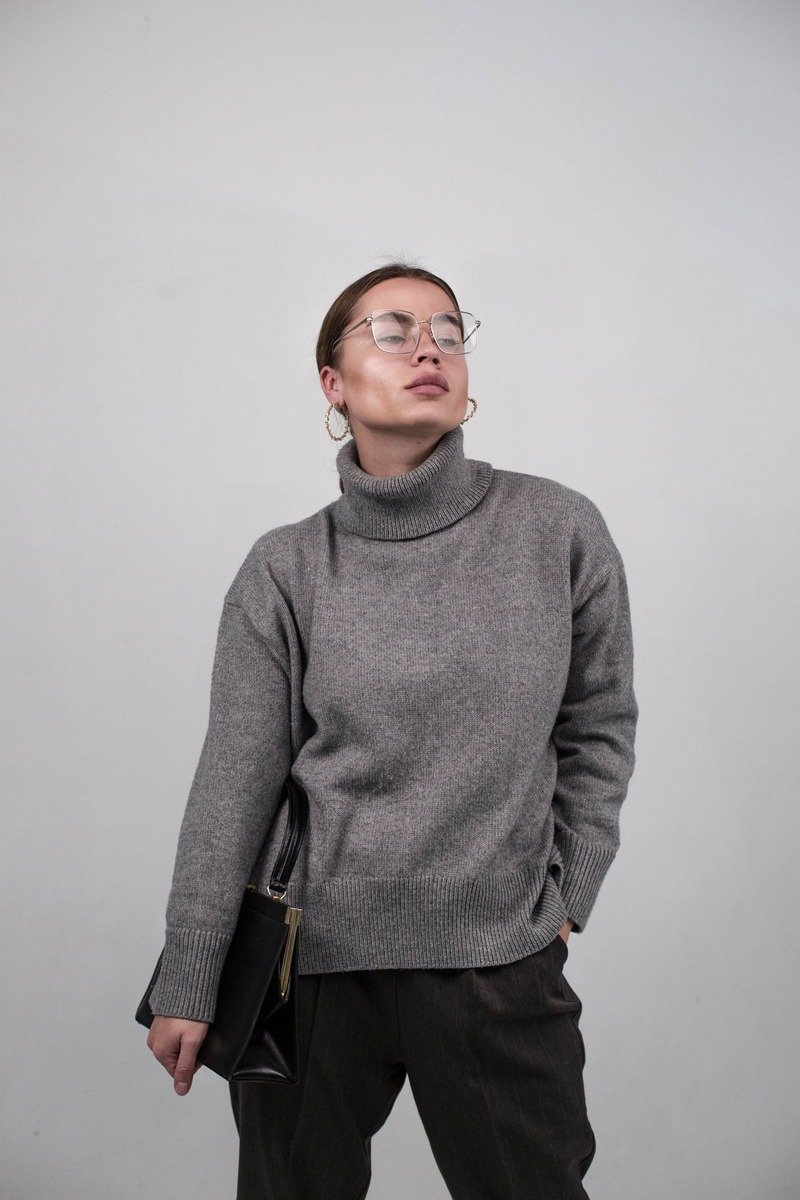 Chunky knit sweater with tailored trousers