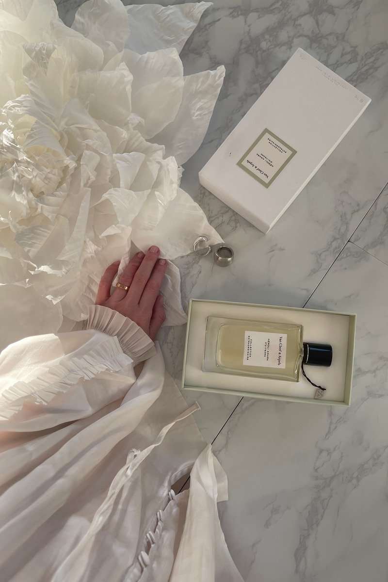 Perfume bottle with whipped cream and caramel dessert