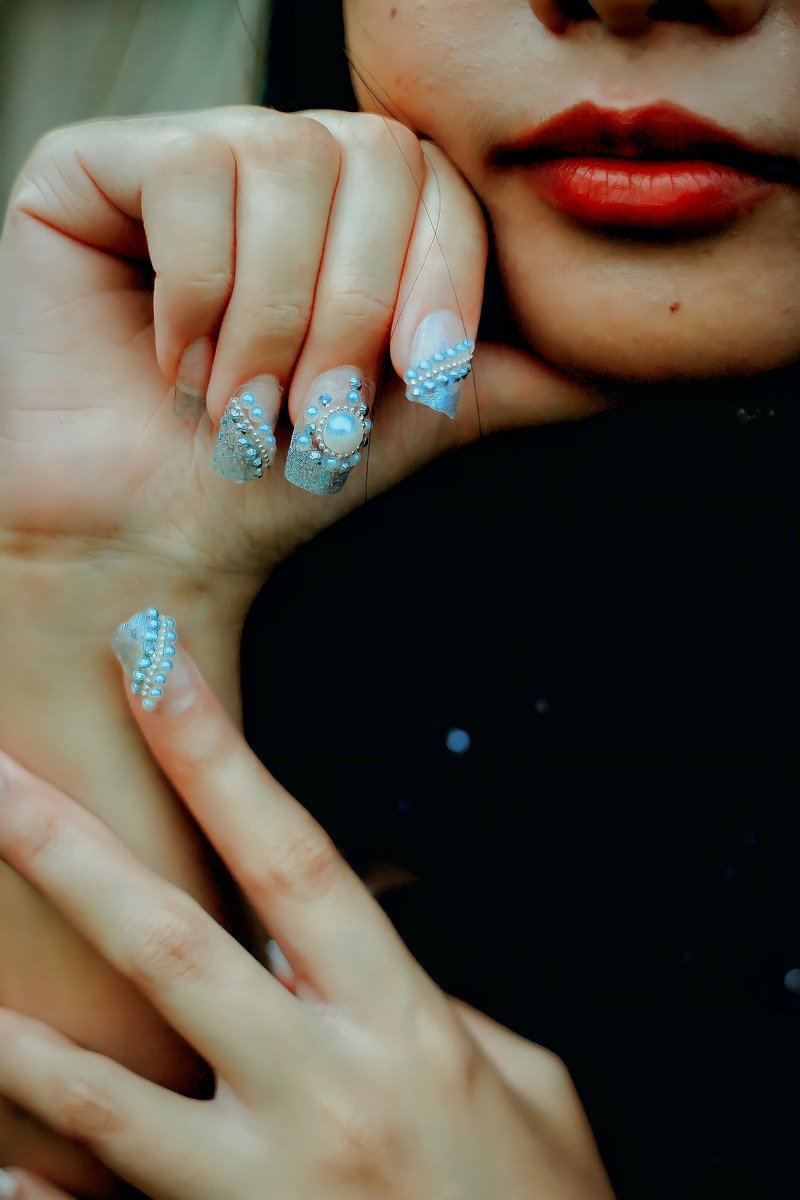 Icy blue 3D bead and pearl dots on sheer nails