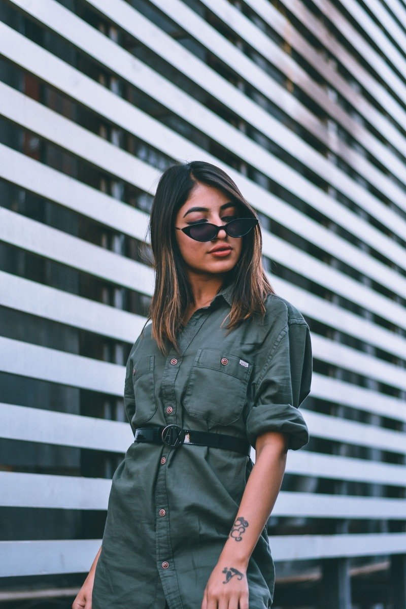 Woman in a belted shirt dress