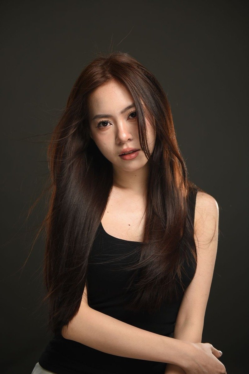 Rich chocolate mocha balayage on long hair with deep glossy tones