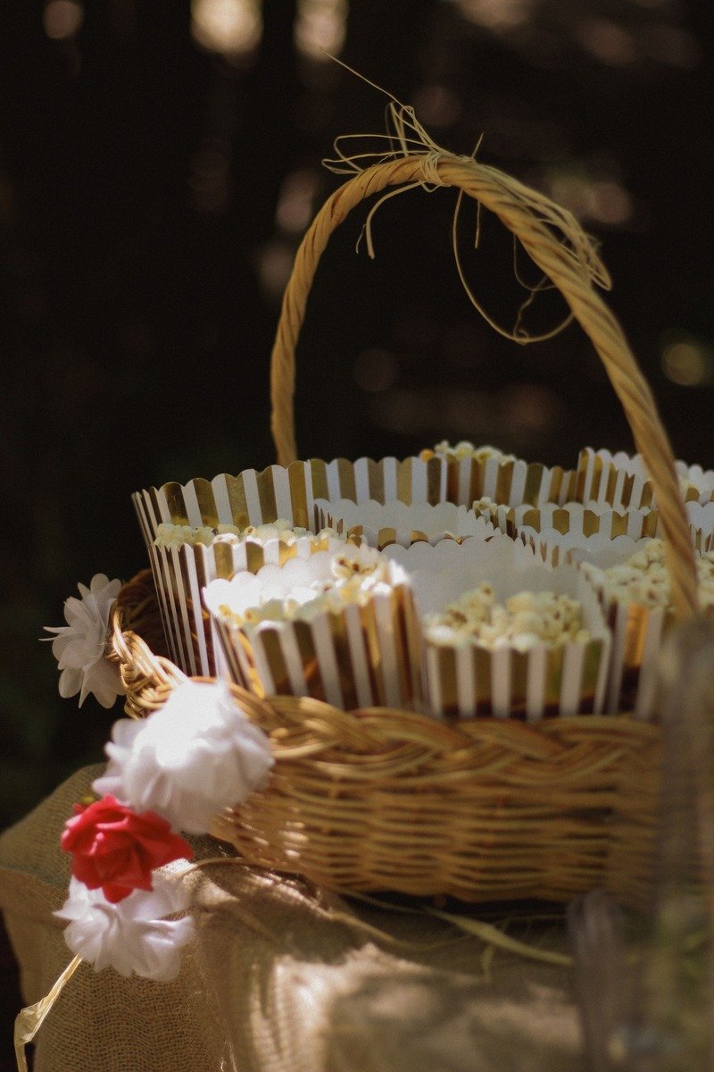 Wicker basket filled with popcorn snack cups