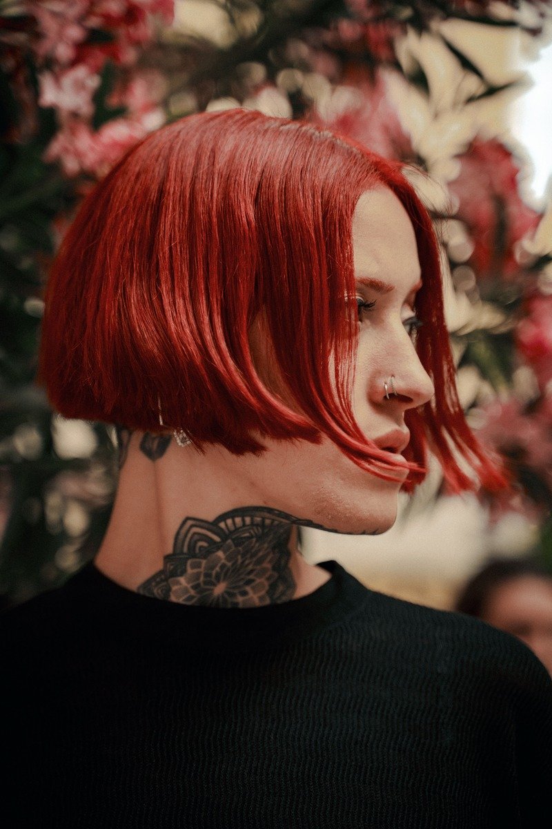 Chin-length bob in cherry cola hair color
