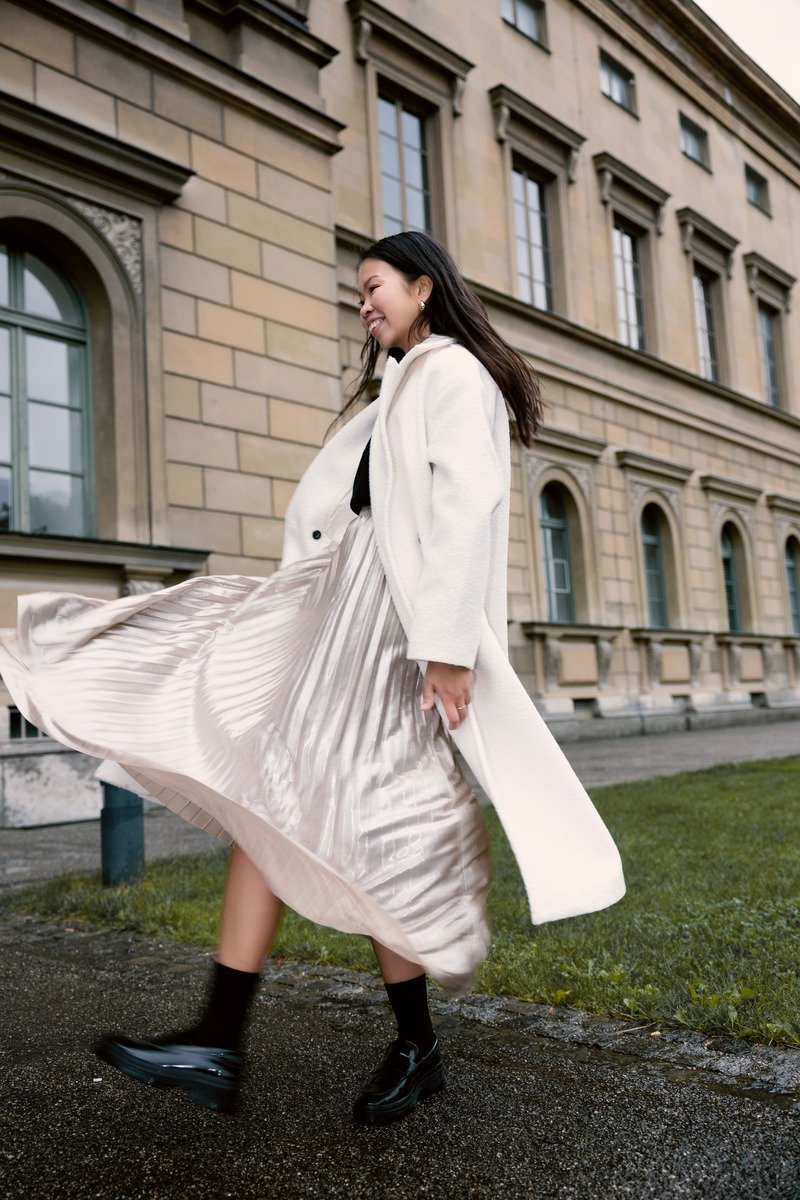 Satin midi skirt with a long coat outfit