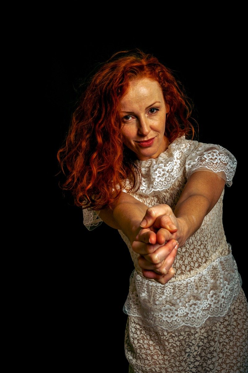 Ginger spice hair color on a smiling woman