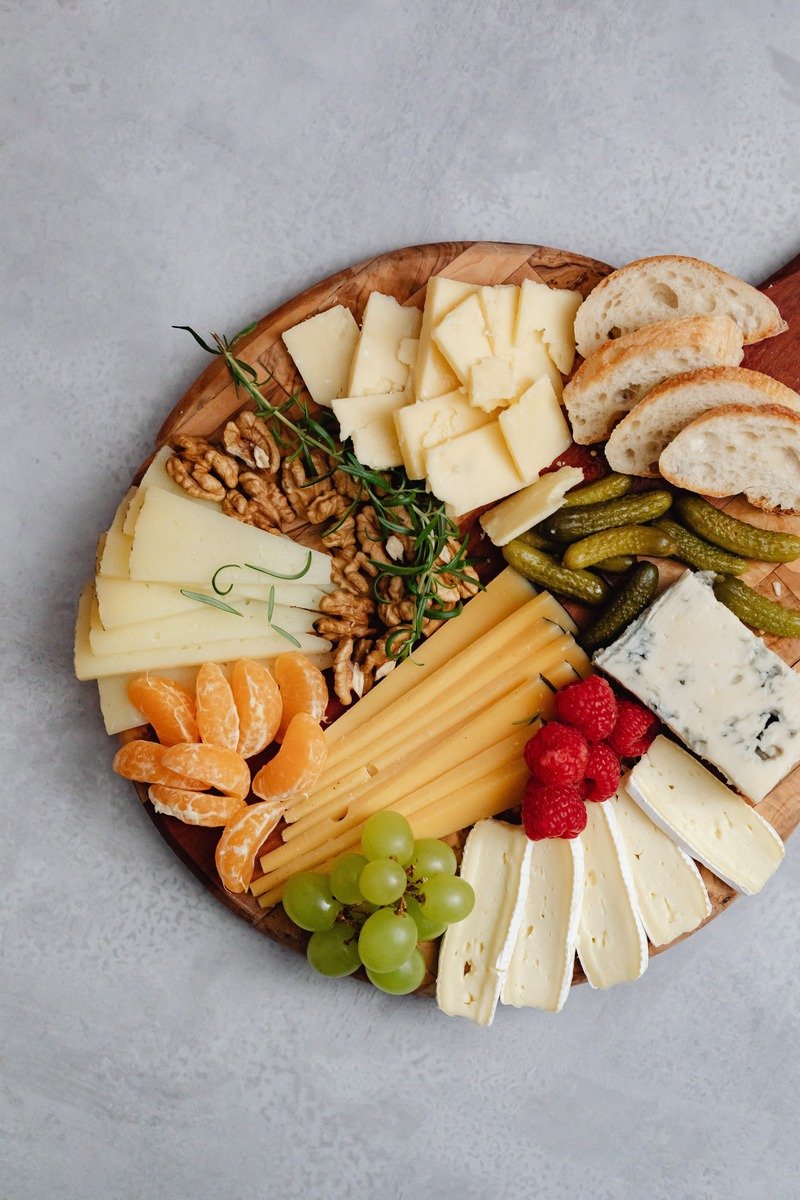 Cheese and charcuterie board with winter fruit