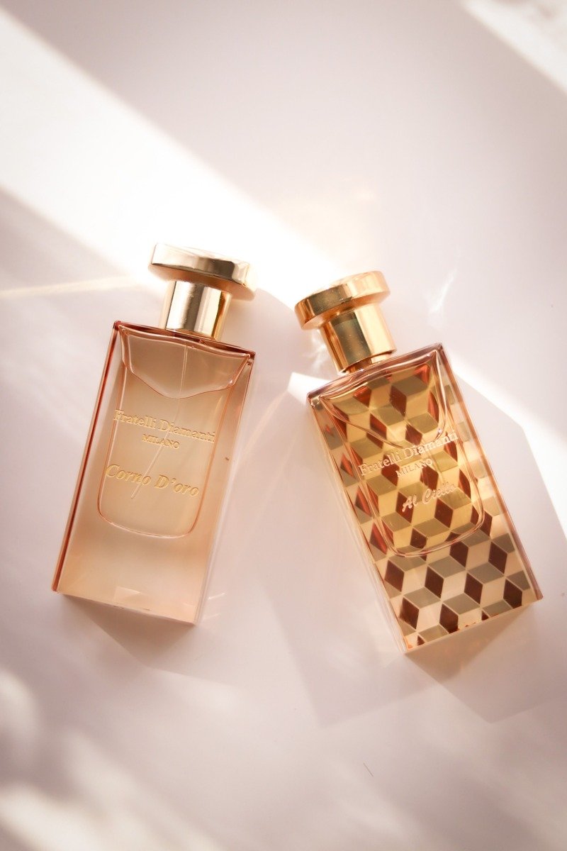 Perfume bottle with caramel drizzle and vanilla pods