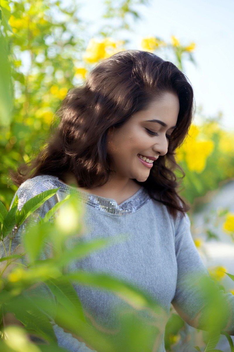 Woman over 50 with wavy shoulder length hair