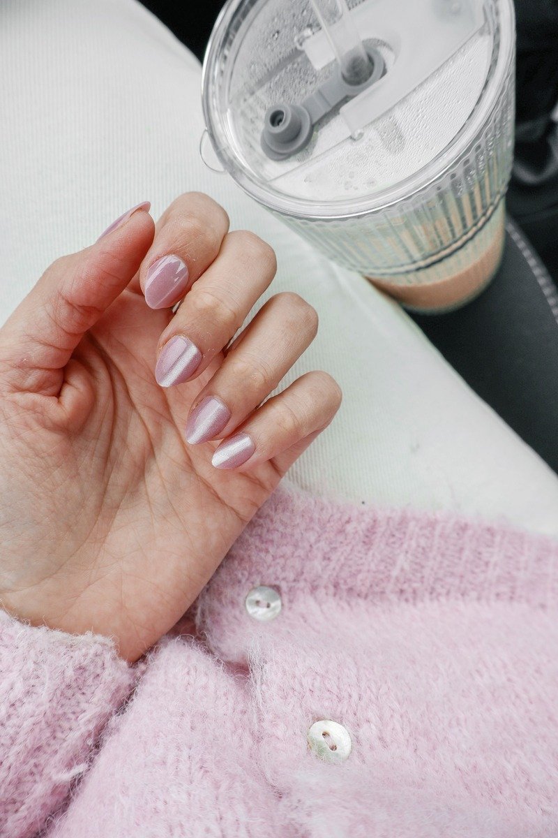 Milky pink glazed nails with a pearly shine