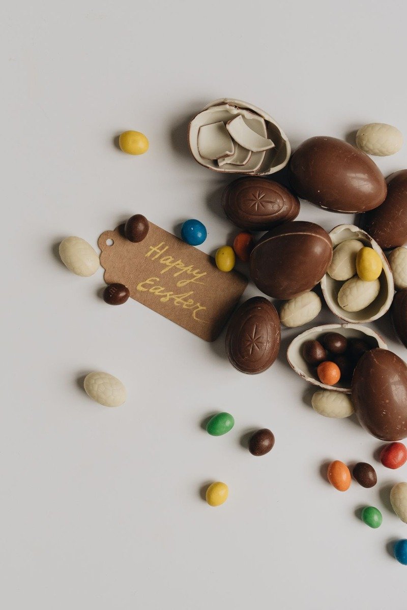 Chocolate easter eggs and candies with a gift tag