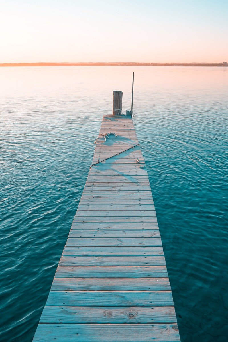 Traverse City Michigan pier on Grand Traverse Bay at sunset