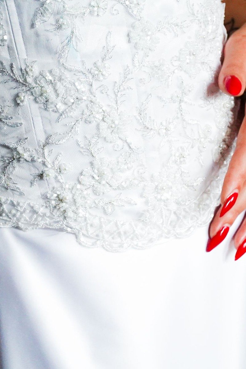 Sheer translucent nails with faint lace pattern