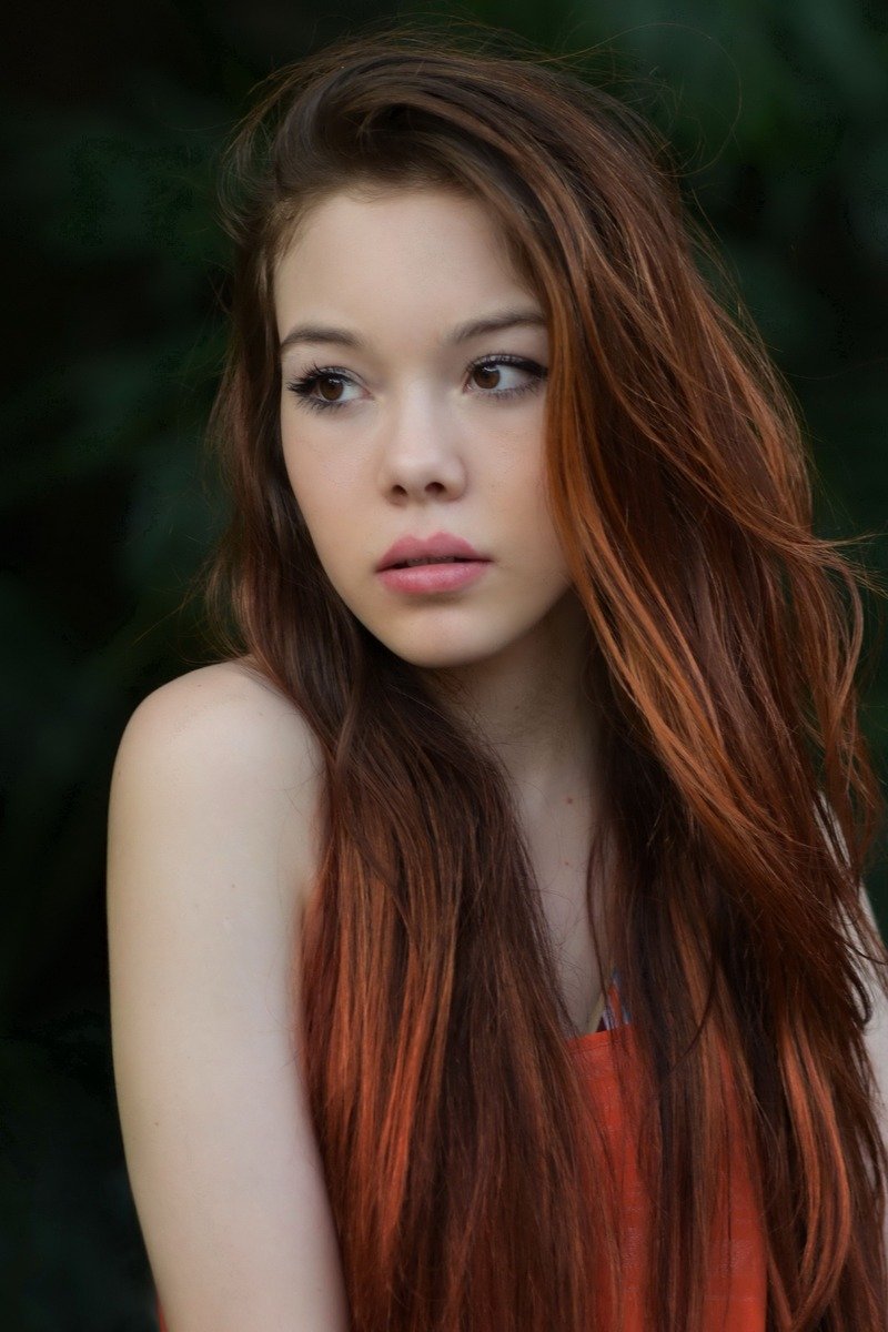 Cherry red highlights on dark brown hair