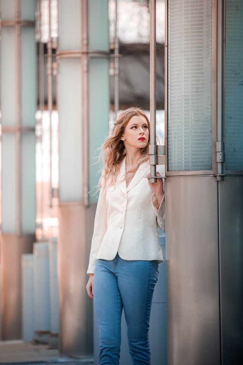 Mom wearing a tailored blazer with dark jeans