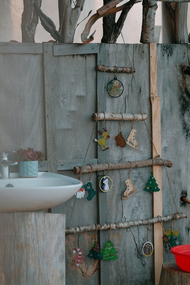 Rustic ladder advent calendar with hanging ornaments