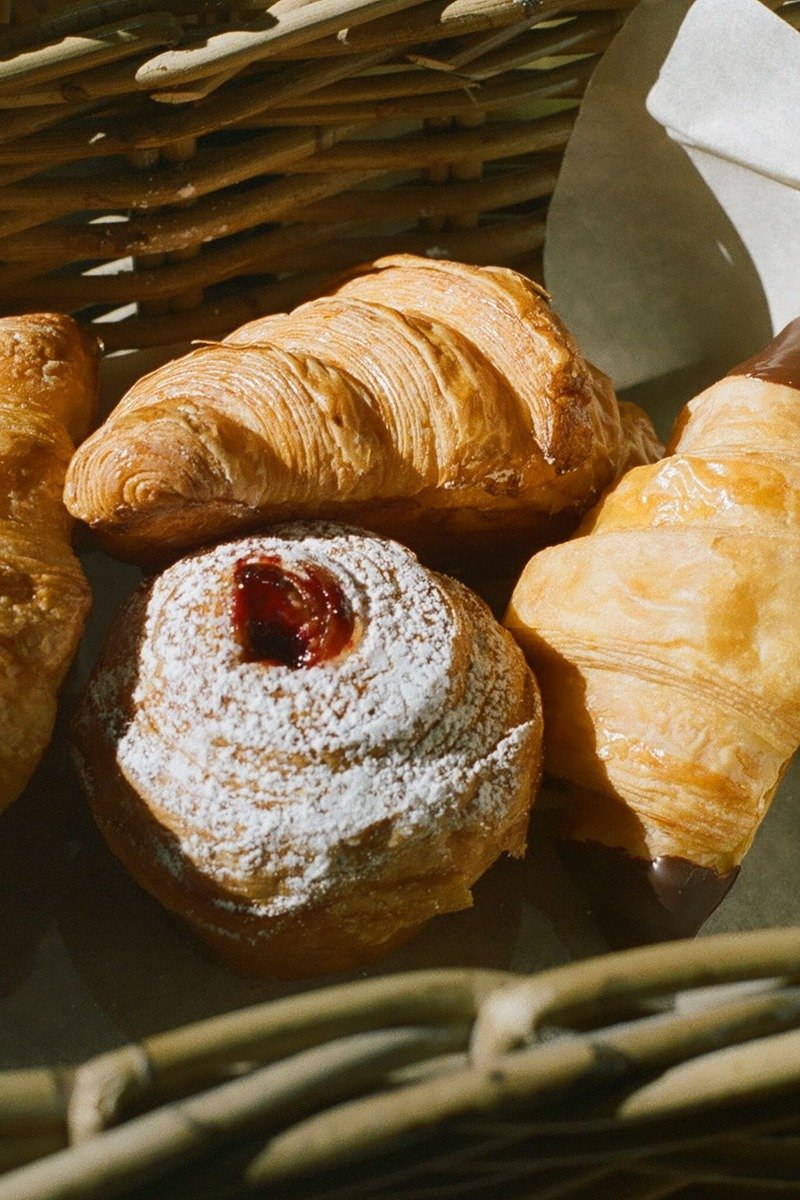 Easter brunch basket with pastries and jam