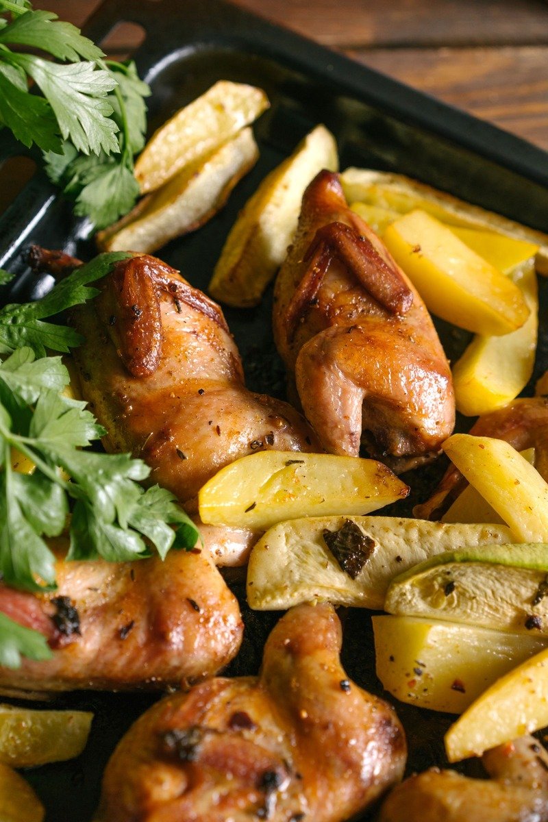 Roast chicken and potatoes on a sheet pan