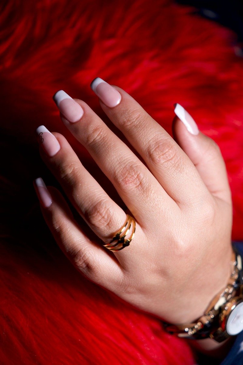 Nude nails with lace pattern only along the tips