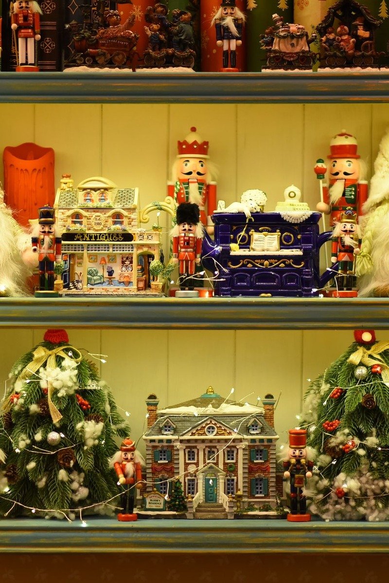 Christmas village inside a glass display cabinet