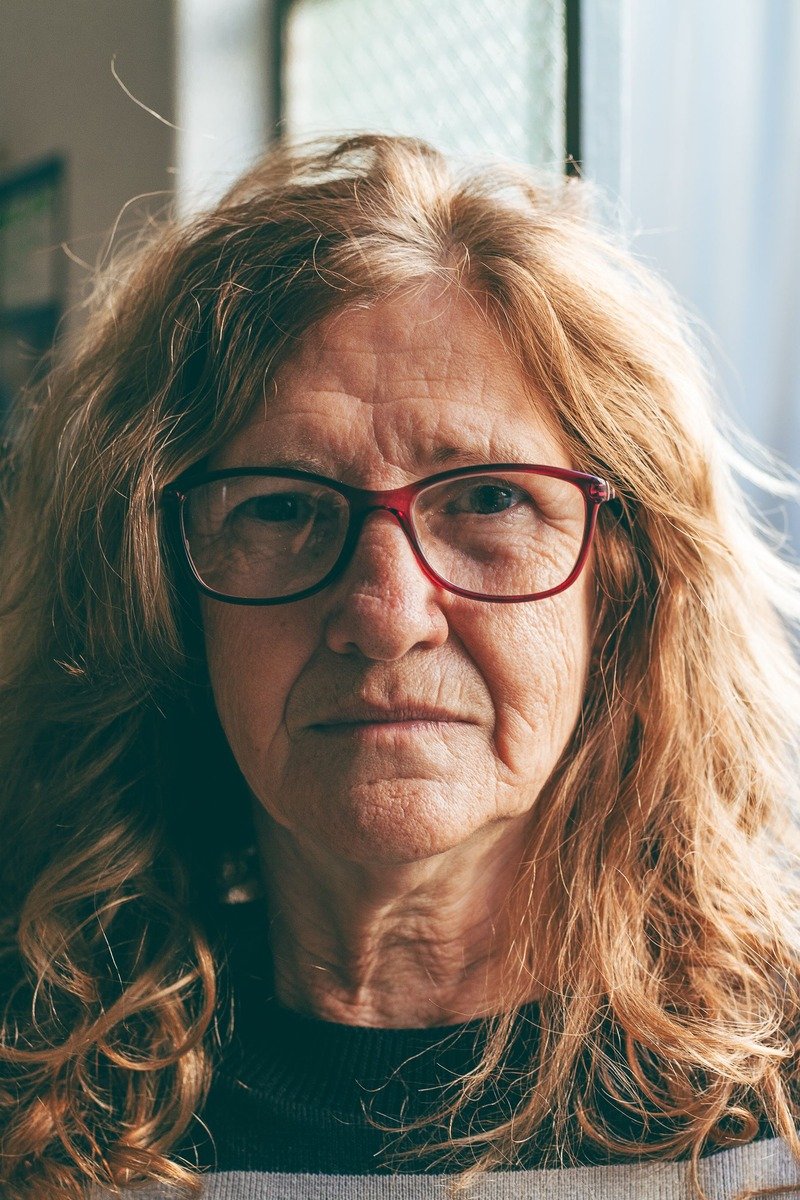 Woman over 50 with soft waves in long hair