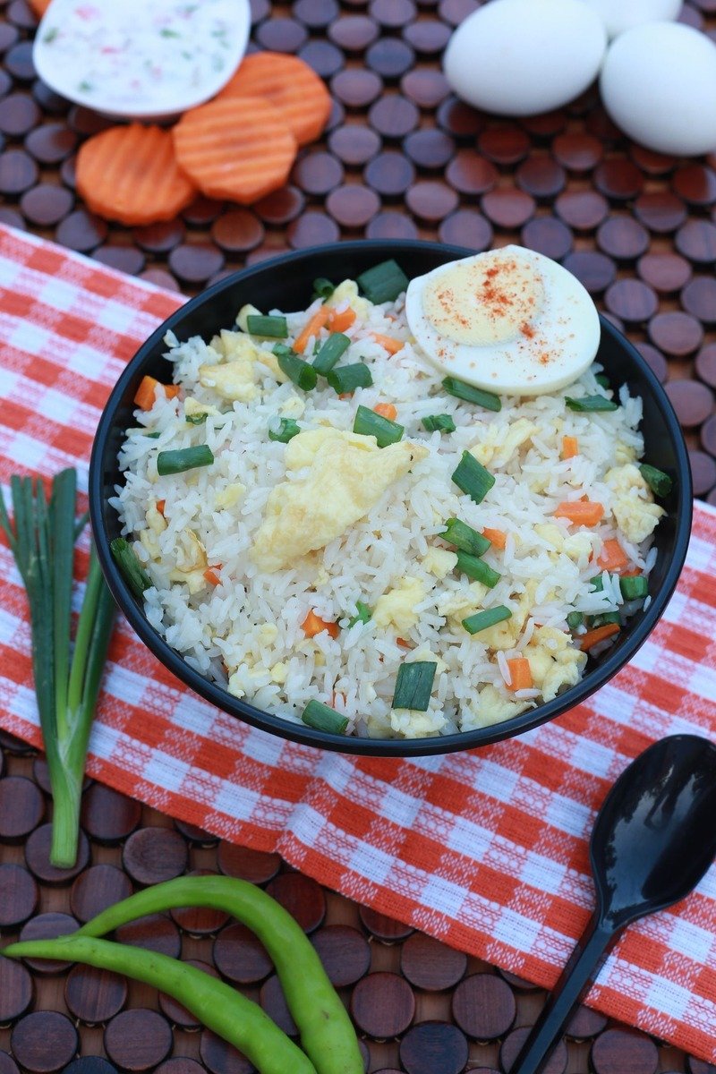 Egg fried rice with vegetables in a pan