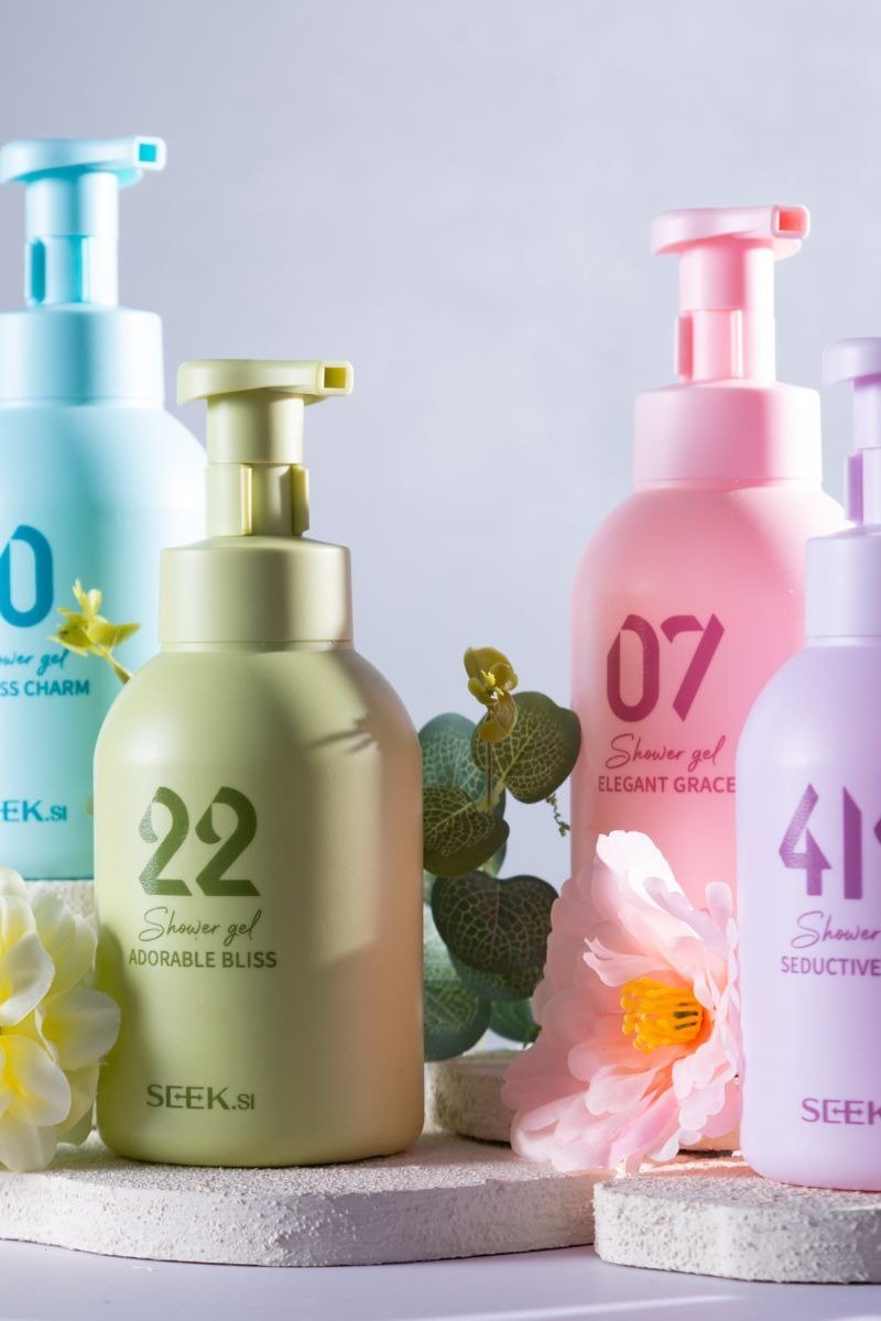 Glycolic acid body wash in a clear bottle with a modern label