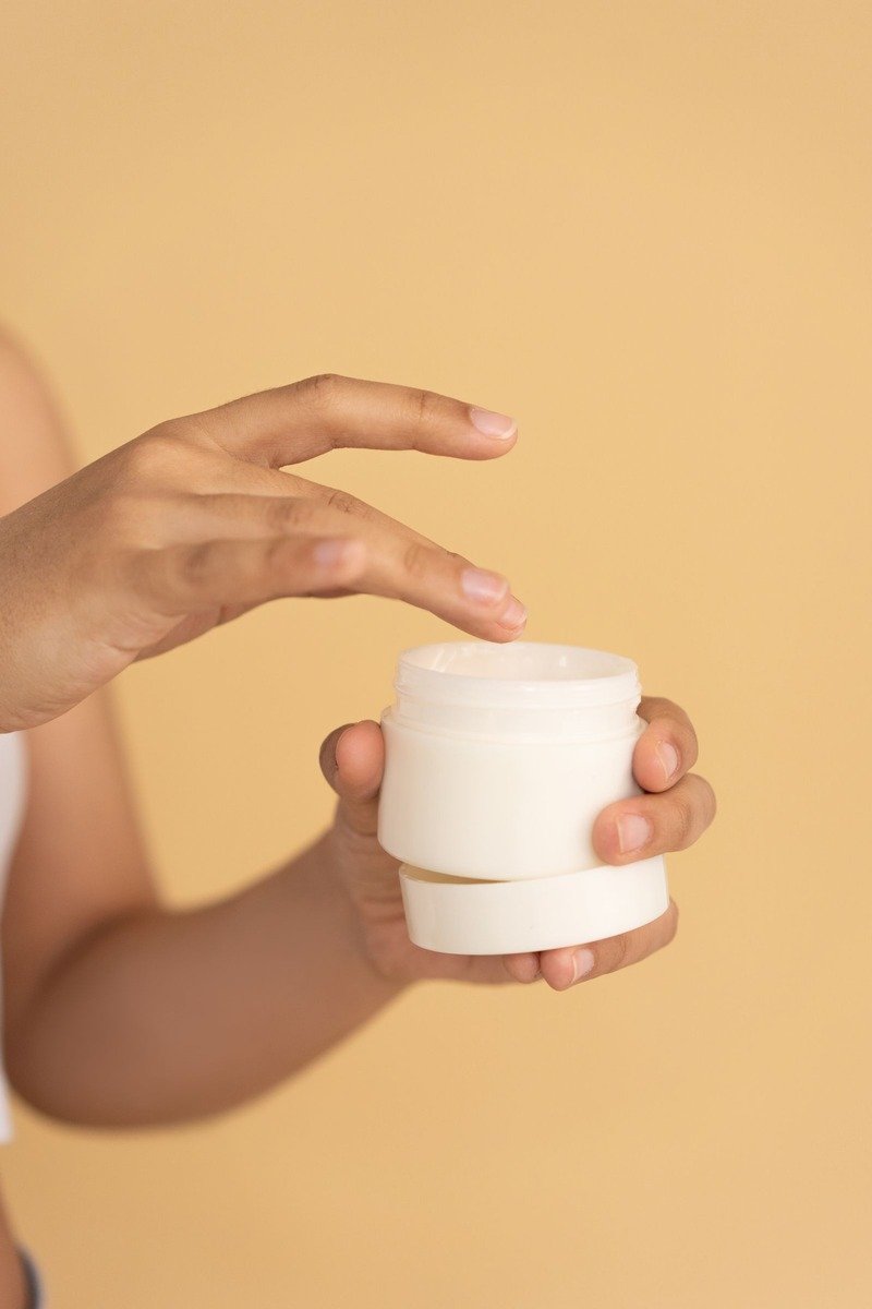 Retinol body lotion smoothed onto legs for silky skin