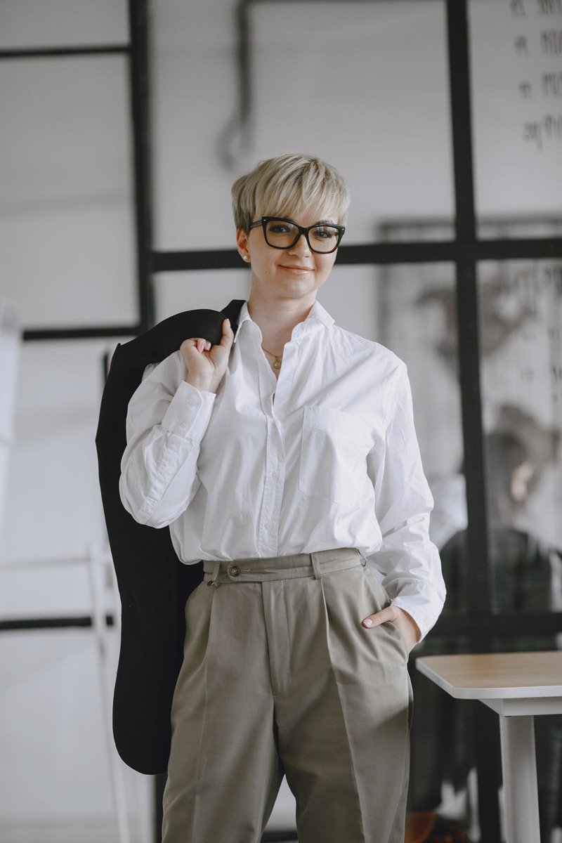 Mom wearing wide-leg trousers with a silk top