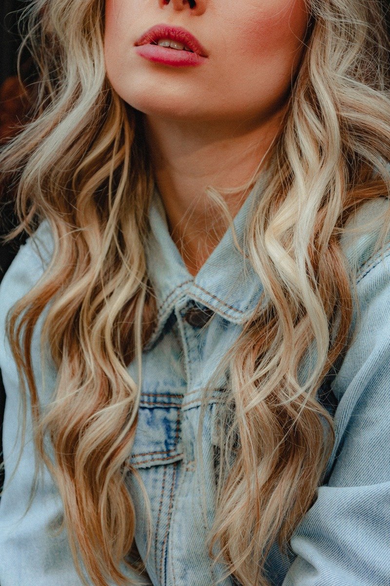 Golden honey blonde winter hair color waves
