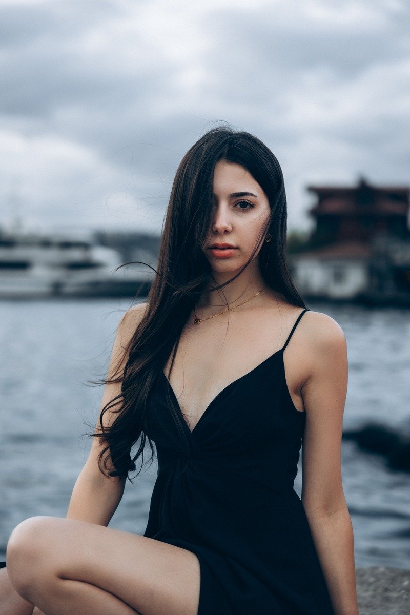 Glossy jet black winter hair color portrait